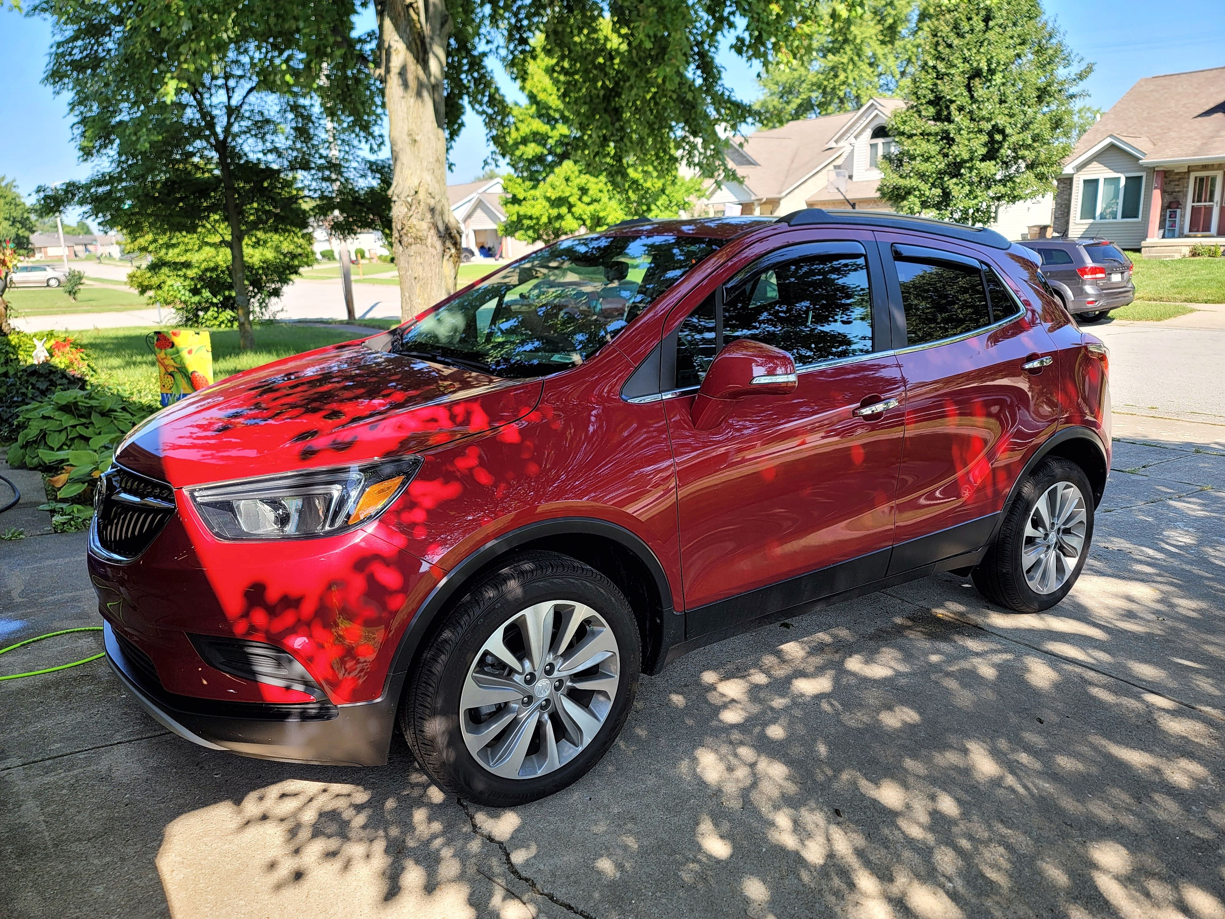 Red Buick Encore with rich metallic finish