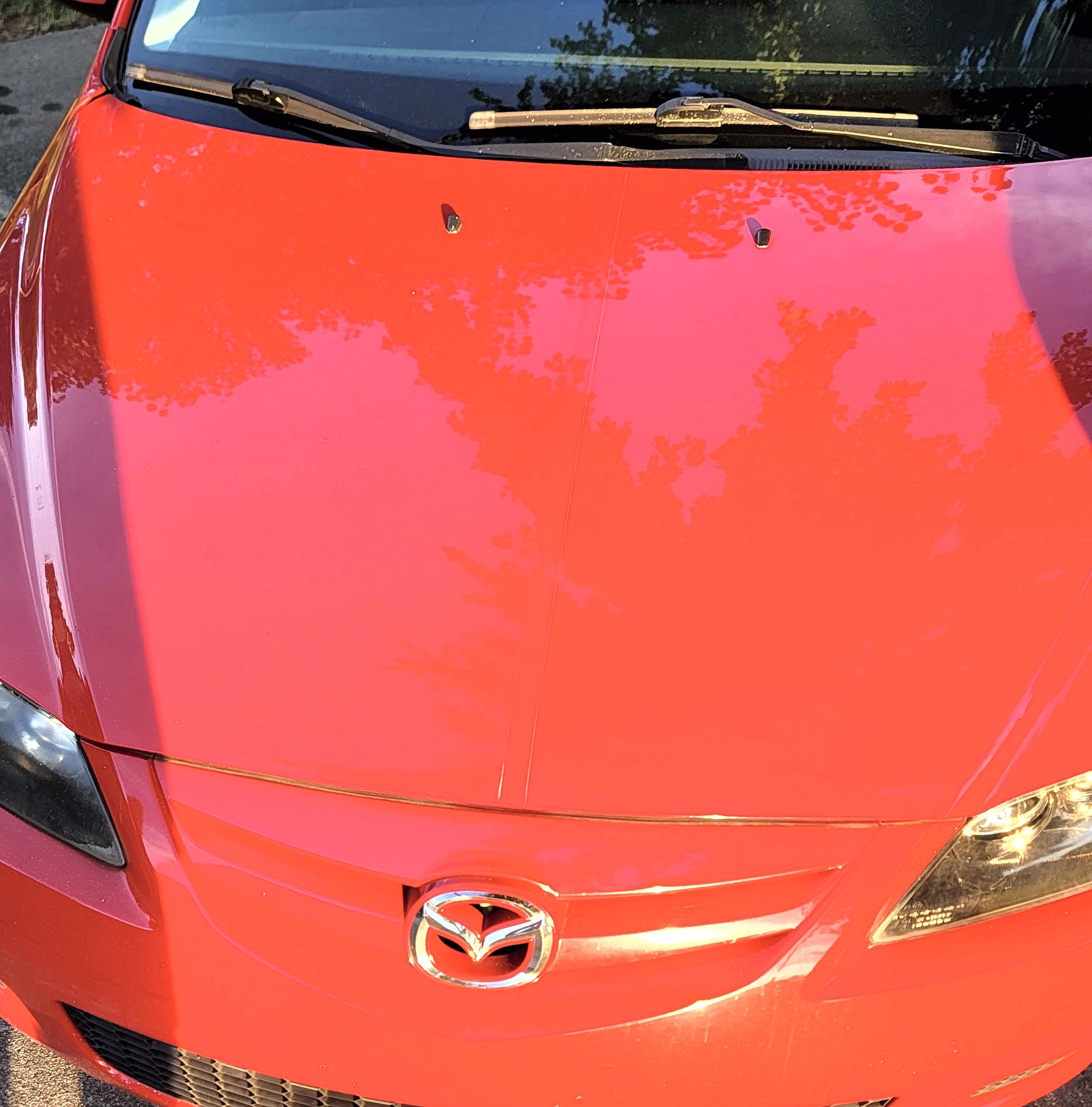Red Mazda 6 with vibrant color restoration
